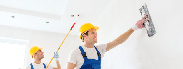 Commercial painters in Orlando, FL prepping and painting office interior walls